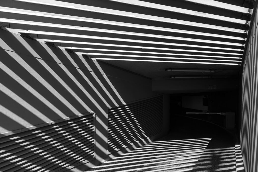 A black and white photo of a hallway